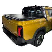 Yellow truck with a black tonneau cover roller shutter
